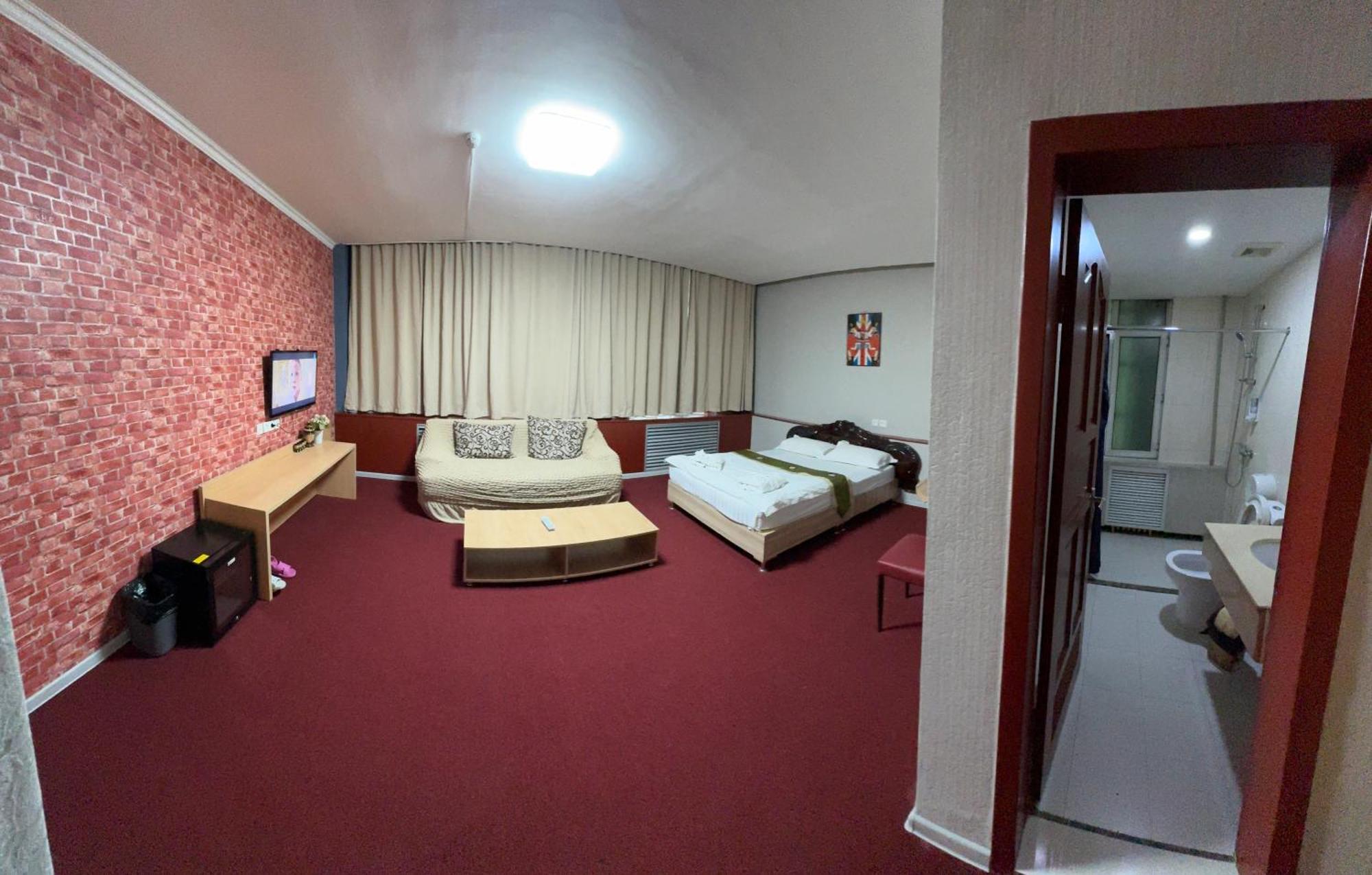 Zolotoi Drakon Hotel Almaty Extérieur photo