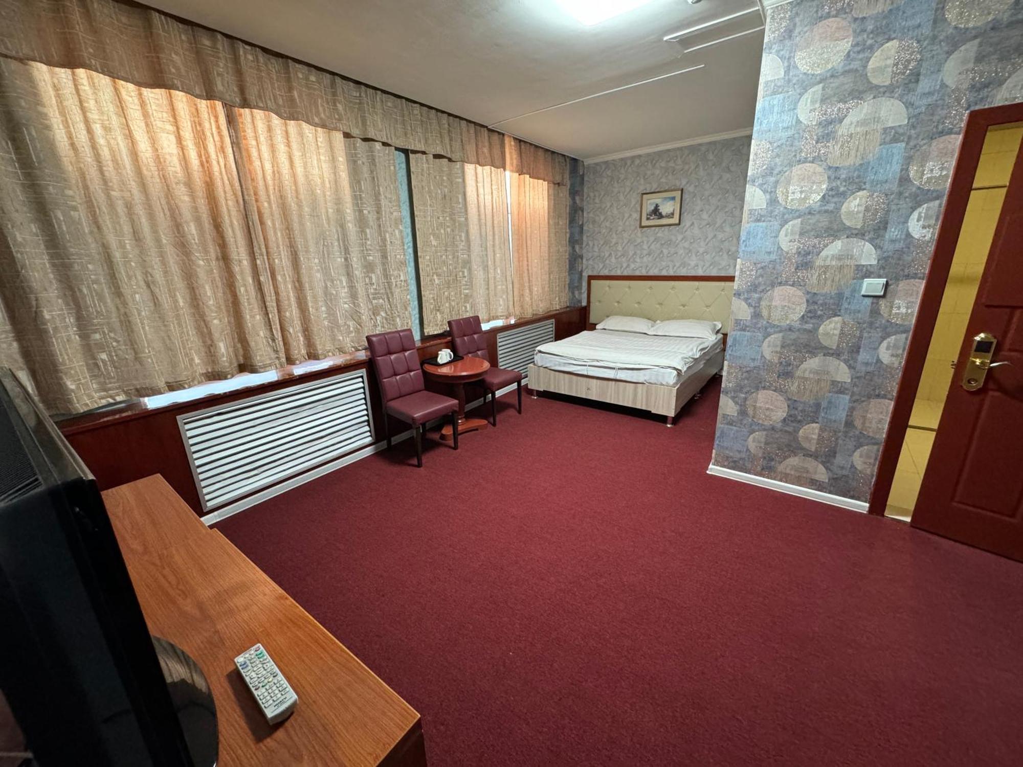 Zolotoi Drakon Hotel Almaty Extérieur photo